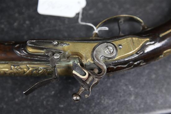 A late 17th century Dutch flintlock holster pistol, overall 19.75in.